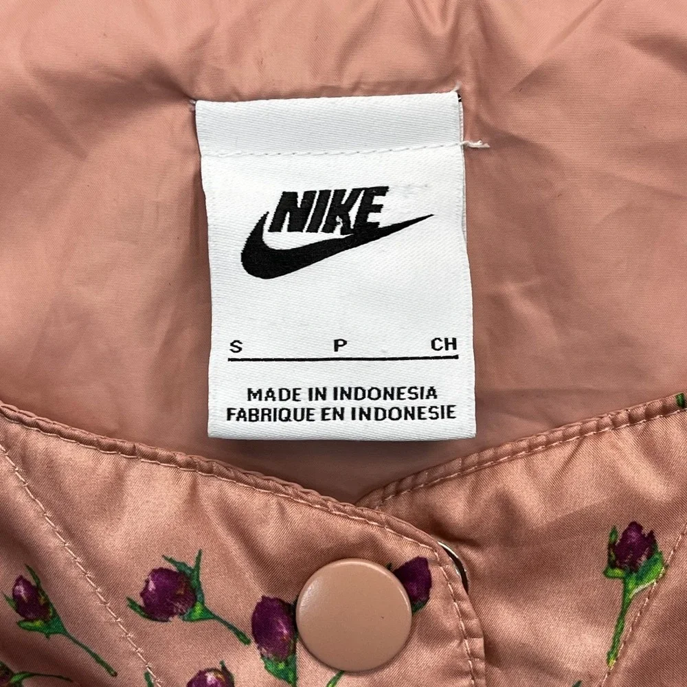Nike Icon Clash women convertible floral quilted jacket S pink‎ satin crop